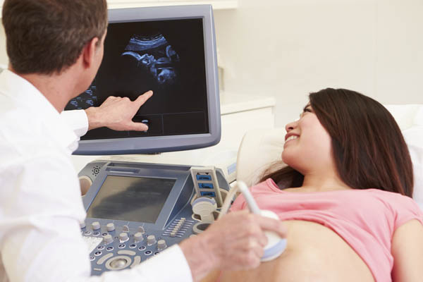 Sonographer with pregnant Mom