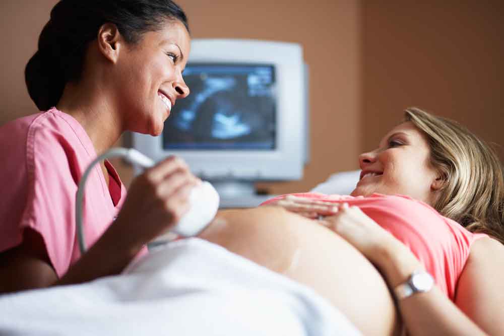 ultrasound sonographer and patient